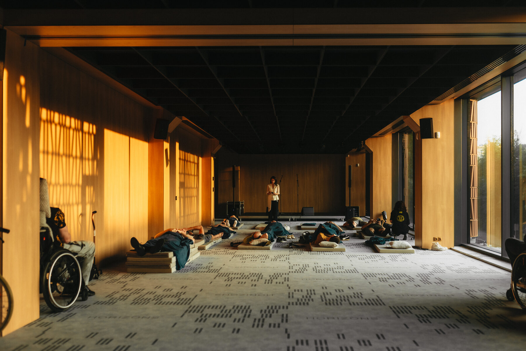 Participants taking part in a calm group movement session