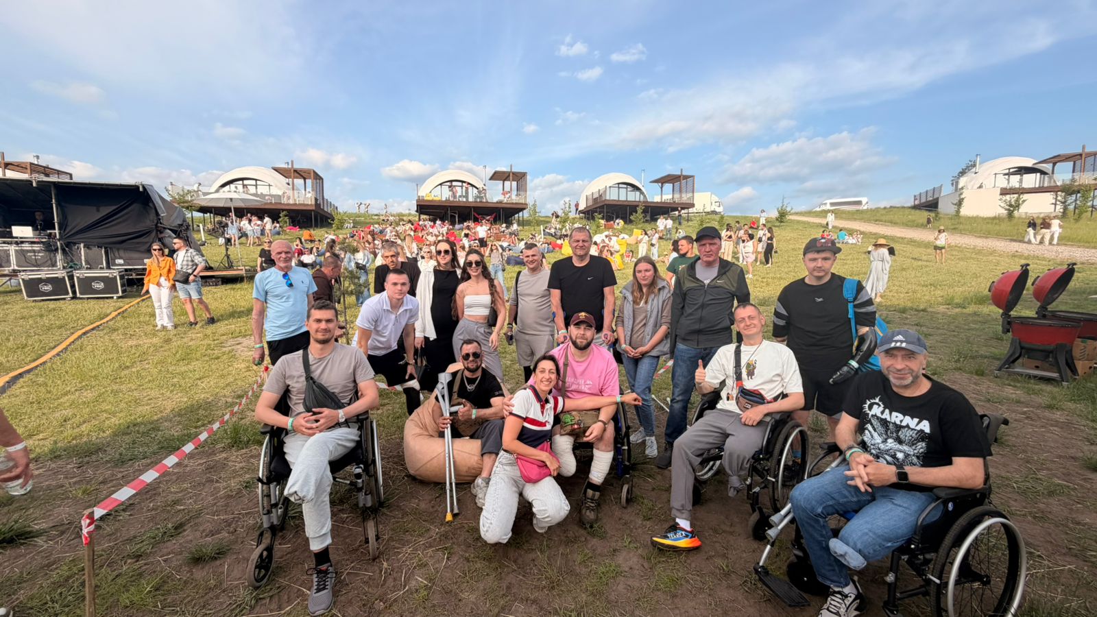 A group of veterans and supporters gathered at an outdoor community event